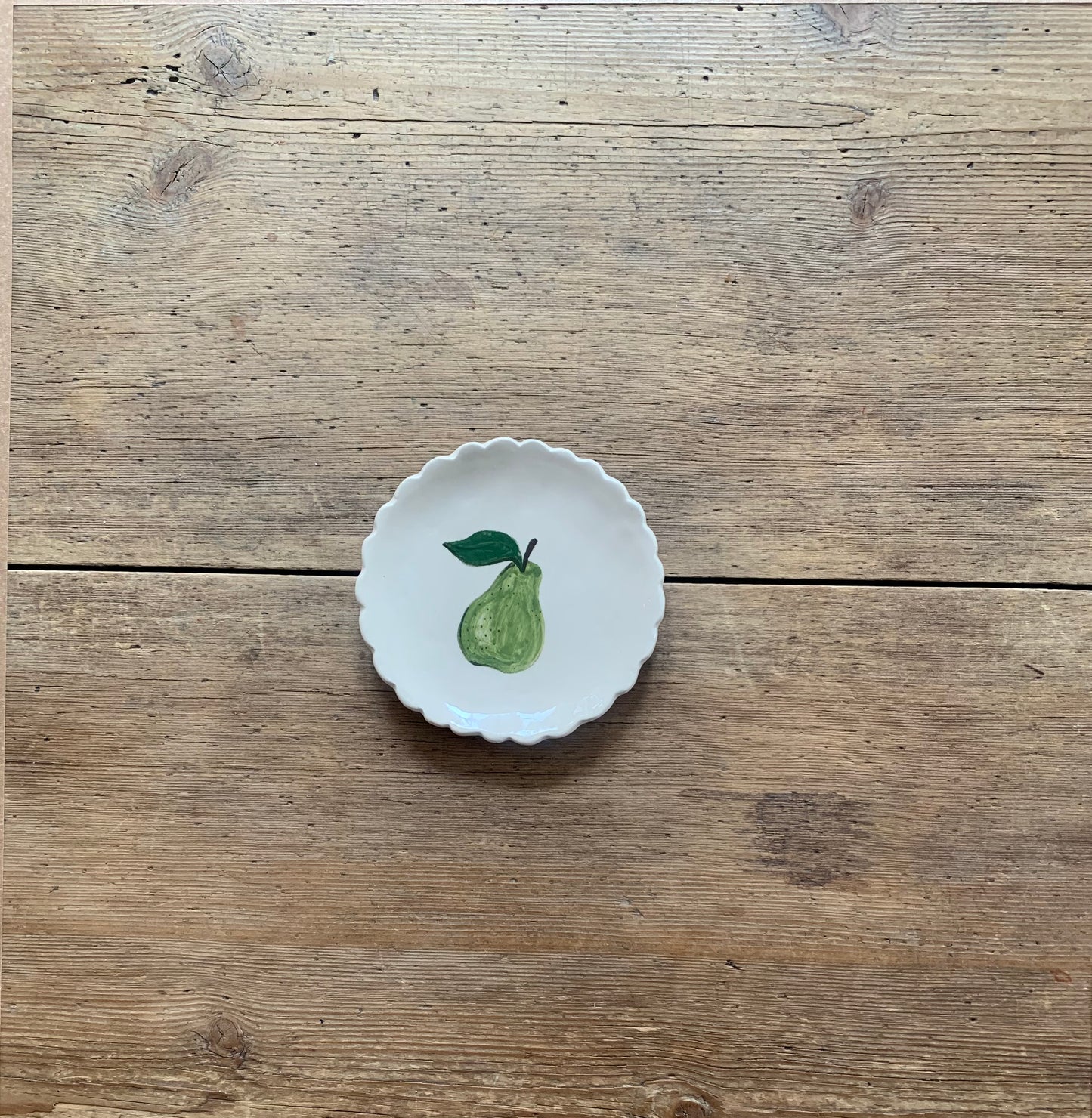 Mini Pear Plate with scalloped edge.